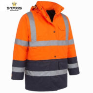 Orange high-visibility work jacket with grey reflective bands, navy lower section, front pockets, and a zip-front closure. Logo reads Staris Workwear in the top-left.