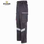 Dark gray cargo work pants with a large side pocket, reflective chevron on the leg, red stitching, and Staris Workwear logo.